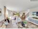 Open-concept space combines living, dining, and kitchen areas with cohesive design and ample lighting at 1611 Spring Lot Dr, Edgemoor, SC 29712