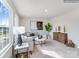 Cozy living room boasts lots of sunlight, comfortable seating and stylish decor at 1623 Spring Lot Dr, Edgemoor, SC 29712