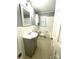 Traditional bathroom with white tile, gray vanity, and a classic, clean design at 1723 Baskins Hill Rd, Heath Springs, SC 29058