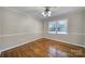 Bedroom with hardwood floors, natural light, and a ceiling fan at 1723 Baskins Hill Rd, Heath Springs, SC 29058