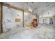 Unfinished garage interior with a sink, storage, and space for projects at 1723 Baskins Hill Rd, Heath Springs, SC 29058