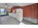 Simple kitchen with linoleum floors and a sliding glass door at 1723 Baskins Hill Rd, Heath Springs, SC 29058