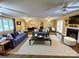 Living room featuring neutral decor, hardwood floors, and cozy furniture at 1723 Baskins Hill Rd, Heath Springs, SC 29058