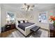 Beautiful main bedroom with a large bed, stylish furnishings, and hardwood floors at 1723 Baskins Hill Rd, Heath Springs, SC 29058