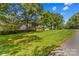 Home with a large front yard, mature trees, and a well-maintained lawn at 1760 Jacobs Way, Sherrills Ford, NC 28673