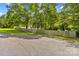 Street view of property with grassy front yard and wooden fence at 1760 Jacobs Way, Sherrills Ford, NC 28673
