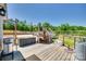 Spacious wooden deck with staircase and outdoor cooking equipment, perfect for entertaining at 1780 Sierra Rd, York, SC 29745
