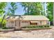 Charming wooden exterior of a building featuring rustic details and surrounding landscaping at 1780 Sierra Rd, York, SC 29745