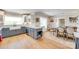 Bright open eat-in kitchen with gray cabinets, white uppers and a breakfast nook with a farm sink at 1780 Sierra Rd, York, SC 29745