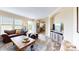 Cozy living room with hardwood floors and comfortable furnishings at 1780 Sierra Rd, York, SC 29745