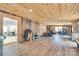 Spacious recreation room with exercise equipment and rustic wood paneling, a flexible living space at 1780 Sierra Rd, York, SC 29745