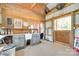 Functional wash area in the barn with a sink, storage cabinets, and convenient access to cleaning tools at 1780 Sierra Rd, York, SC 29745