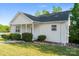 Charming home with a covered front porch and well-maintained landscaping for great curb appeal at 1806 Red Bird Cir, Concord, NC 28025