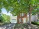 Charming two-story home with a combination of brick and siding, plus an attached one car garage at 2017 Beckwith Ln, Waxhaw, NC 28173