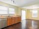A well-equipped kitchen area and dining area with stainless steel appliances at 2017 Beckwith Ln, Waxhaw, NC 28173
