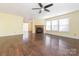 Spacious living room featuring a fireplace, hardwood floors and lots of natural light at 2017 Beckwith Ln, Waxhaw, NC 28173
