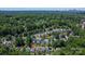 Home's location in a lush, tree-filled community, with the city skyline in the distance at 2126 Downing St, Charlotte, NC 28205