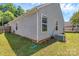 Exterior side of the home with siding and an AC unit at 2126 Downing St, Charlotte, NC 28205