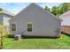 Exterior of the home with siding and an AC unit at 2126 Downing St, Charlotte, NC 28205