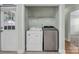 A dedicated laundry area with modern washer and dryer units at 2126 Downing St, Charlotte, NC 28205