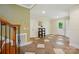 Basement hallway with tile floor, staircase and doors at 221 Grayrock Dr, Statesville, NC 28677