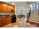 Basement area with kitchenette, tile floor, staircase and pool table at 221 Grayrock Dr, Statesville, NC 28677