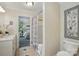 Bright bathroom with tile floors and views of the bedroom at 221 Grayrock Dr, Statesville, NC 28677