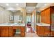 Dual sink vanity in a bathroom featuring a step-through to the large main bedroom at 221 Grayrock Dr, Statesville, NC 28677