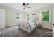 Cozy bedroom with natural light and carpeted floor at 221 Grayrock Dr, Statesville, NC 28677