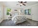 Bedroom with carpeted floor and two windows at 221 Grayrock Dr, Statesville, NC 28677