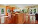 Open kitchen layout boasts an oversized island, stainless steel appliances, and seamless flow to the living spaces at 221 Grayrock Dr, Statesville, NC 28677