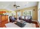 Comfortable living room showcases hardwood floors, plush seating, and bright, natural light at 221 Grayrock Dr, Statesville, NC 28677