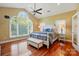 Bright main bedroom with high ceilings, large window, and beautiful hardwood floors at 221 Grayrock Dr, Statesville, NC 28677