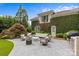 Outdoor patio with a seating area, barbecue and lush landscaping, perfect for relaxing and enjoying the outdoors at 2322 Hopedale Ave, Charlotte, NC 28207
