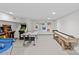 Finished basement with an air hockey table, foosball table, and a variety of fun arcade games at 2322 Hopedale Ave, Charlotte, NC 28207