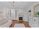 Bright bedroom features a fireplace, white built-in bookshelves and cabinets for ample storage space at 2322 Hopedale Ave, Charlotte, NC 28207