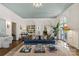 Elegant living room with hardwood floors, coffered ceiling, and comfortable seating area at 2322 Hopedale Ave, Charlotte, NC 28207