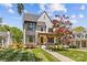 Charming two-story home featuring a manicured lawn and inviting front porch at 2509 Bay St, Charlotte, NC 28205