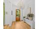 Bright foyer with hardwood floors, stylish console table, and decorative accents at 2509 Bay St, Charlotte, NC 28205
