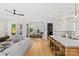 Open-concept living space featuring hardwood floors, modern decor, and ample natural light at 2509 Bay St, Charlotte, NC 28205