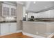A well-equipped kitchen features granite countertops, stainless steel appliances, and white cabinets at 2608 Carmarthen Ct, Matthews, NC 28104