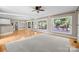 Spacious living area with hardwood floors, fireplace, and abundant natural light at 2608 Carmarthen Ct, Matthews, NC 28104