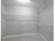 A simple walk-in closet with white wire shelving at 2608 Carmarthen Ct, Matthews, NC 28104