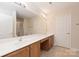 Bright bathroom with a long vanity and ample counter space at 2704 Polo Club Blvd, Matthews, NC 28105
