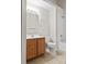 Bathroom features a wooden vanity and a shower over tub at 2704 Polo Club Blvd, Matthews, NC 28105