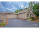 Charming home with a two-car garage and meticulously maintained grounds at 2704 Polo Club Blvd, Matthews, NC 28105