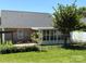 Backyard featuring a patio, garden, and enclosed sunroom at 2800 Deans Ct, Monroe, NC 28110