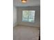 Bright bedroom with a window at 2800 Deans Ct, Monroe, NC 28110