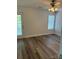 Bedroom with a window and door leading to the backyard at 2800 Deans Ct, Monroe, NC 28110