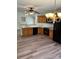 Kitchen boasts wood cabinets, granite countertops, stainless appliances and modern lighting at 2800 Deans Ct, Monroe, NC 28110